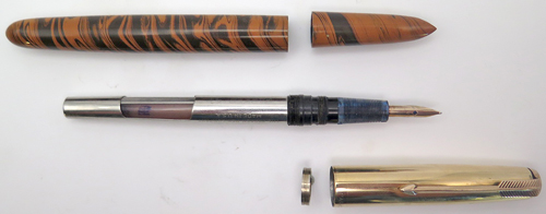 ITEM #2120: PARKER/BEXELY 51. SHELL AND BARREL WERE MADE BY BEXELY. THE INNER WORKINGS MADE BY PARKER. UNIQUE TIGER SWIRL PATtERN. PARKER 51 14K TUBULAR NIB IN BROAD/MEDIUM