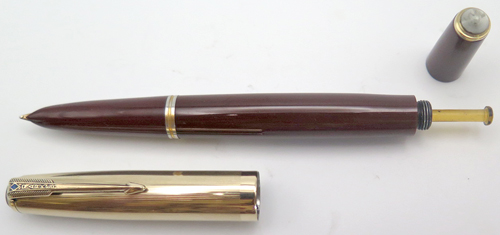 ITEM #6403: PARKER 51 DOUBLE JEWEL VACUMATIC IN BURGUNDY WITH GOLD FILLED CAP & TRIM, "7" DATE CODE AND BROAD NIB. BOTTON FILLER.