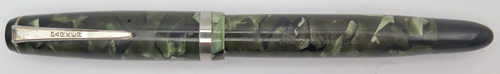ITEM #1666: PARKER CHALLENGER FOUNTAIN PEN IN GREEN/BLACK MARBLE. LENGTH IN 5 1/4" WHEN CAPPED. NIB IS GOLD "PARKER PEN MADE IN USA" IN MEDIUM. NICKLE PLATED TRIM.