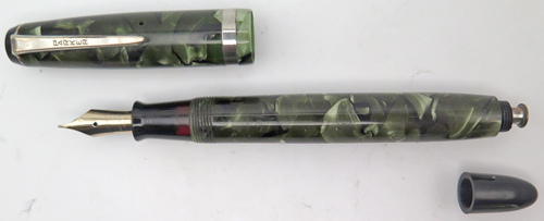 ITEM #1666: PARKER CHALLENGER FOUNTAIN PEN IN GREEN/BLACK MARBLE. LENGTH IN 5 1/4" WHEN CAPPED. NIB IS GOLD "PARKER PEN MADE IN USA" IN MEDIUM. NICKLE PLATED TRIM.