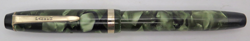 ITEM #1906: PARKER CHALLENGER FOUNTAIN PEN IN GREEN MARBLE. LENGTH OF PEN IS 4 3/4" WHEN CAPED. NIB IS 14 K IN FINE/MEDIUM. BOTTOM OF NIB SAYS "PARKER PEN MADE IN USA 27". 