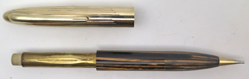 ITEM #2491: SHEAFFER CREST PENCIL WITH GOLD FILL CAP IN BROWN/GOLD STRIPED. Mechanism works both ways.