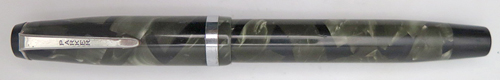 ITEM #3057: PARKER CHALLENGER FOUNTAIN PEN IN GREEN/BLACK MARBLE. NICKLE PLATTED TRIM. LENGTH IS 5 1/8" WHEN CAPPED. NIB IS "PARKER PEN MADE IS USA" GOLD IN FINE.