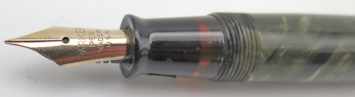 ITEM #3057: PARKER CHALLENGER FOUNTAIN PEN IN GREEN/BLACK MARBLE. NICKLE PLATTED TRIM. LENGTH IS 5 1/8" WHEN CAPPED. NIB IS "PARKER PEN MADE IS USA" GOLD IN FINE.