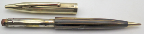 ITEM #3141: SHEAFFER CREST PENCIL WITH GOLD FILL CAP IN BROWN/GOLD STRIPED. Mechanism works both ways. 