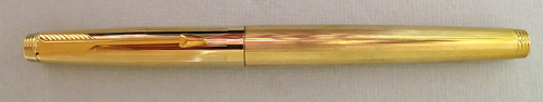 #3888: GOLD PLATED PARKER 75 WITH MEDIUM/FINE 18K GOLD PARKER NIB. NO DENTS, DINGS OR BRASSING. Comes with Paker piston converter