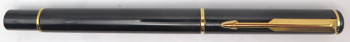 ITEM #4785: PARKER PLACE VENDOME or RIALTO 88 FOUNTAIN PEN IN GLOSSY BLACK LACQUER. GOLD CIRCLES ON BOTH TASSIE. GOLD PLATED TRIM. BROAD GOLD NIB. Comes with Parker piston converter filling system.