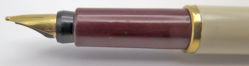 ITEM #4788: PARKER ARROW FOUNTAIN PEN IN CREAM. BLIND CAP & SECTION ARE MAROON. GOLD PLATED TRIM. "PARKER" GOLD NIB IN BROAD