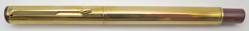 ITEM #4789: PARKER ARROW GOLD PLATED BALLPOINT. MAROON BLIND CAP AND SECTION. BLACK TASSIES