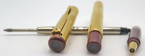 ITEM #4789: PARKER ARROW GOLD PLATED BALLPOINT. MAROON BLIND CAP AND SECTION. BLACK TASSIES