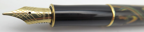 ITEM #4795: PARKER INSIGNIA FOUNTAIN PEN IN ORANGE/BLUE/BLACK SWIRL. GOLD PLATED TRIM. NIB IS 18K IN BROAD.