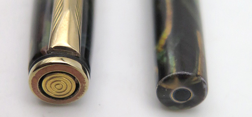 ITEM #4795: PARKER INSIGNIA FOUNTAIN PEN IN ORANGE/BLUE/BLACK SWIRL. GOLD PLATED TRIM. NIB IS 18K IN BROAD.