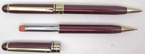ITEM #4908 SET: PIERRE CARDIN BALL POINT + PENCIL SET IN BURGANDY. GOLD PLATED TRIM. LIKE NEW CONDITION. PENCIL USES .036" LEAD. MECHANISMS BOTH WORK