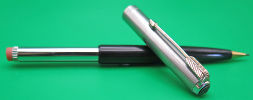 ITEM #4957: PARKER 51 BLACK TWIST PENCIL. LEAD IS .036", .9mm. LUSTRALOY CAP. GOLD FILL TRIM.