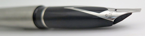 ITEM #5112: SHEAFFER TARGA FOUNTAIN PEN IN BRUSHED STAINLESS STEELE. HAS 4 DEGREE LEFT OBLIQUE NIB IN BROAD. NEW OLD STOCK.