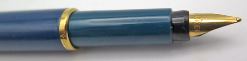 ITEM #5193: PARKER PLACE VENDOME BLUE LACQUER FOUNTAIN PEN. GOLD PLATED TRIM. TASSIES + SECTION IN TOURQUIS. GOLD CIRCLE ON TASSIES. GOLD NIB IS BROAD.