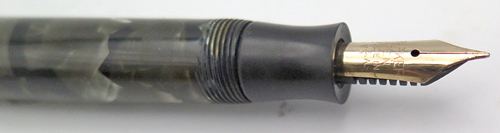 ITEM #5941: PARKER DESK PEN IN MARBLED BLACK/GREEN. GOLD NIB IS MEDIUM "PARKER PEN MADE IN USA". Nib in imprinted with an "8", though the it is not a #8 nib. 