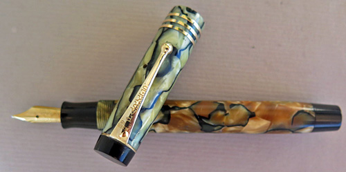 CANADIAN PARKER STREAMLINED DUOFOLD JUNIOR IN CRACKED ICE AGING TO TORTOISESHELL. FLEXIBLE NIB 