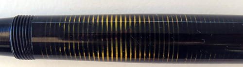 #6231: PARKER STD SIZE LAMINATED VACUMATIC WITH GOOD CLARITY IN BLACK WITH CLEAR LAMINATIONS & WIDE CHEVRON BAND. MEDIUM/FINE NIB