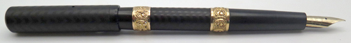 ITEM #6444: RARE WATERMAN EYEDROPPER 16 FOUNTIAN PEN IN BLACK CHASED HARD RUBBER. STONG CHASING AND NO BROWING ON SURFACE. IDEAL NEW YORK #6 FLEXIBLE 14K NIB IN FINE/MEDIUM. TWO GOLD FILL HAND-WORKED BANDS.