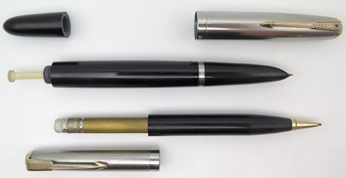 ITEM #6497: PARKER 51 SET, FOUNTAIN PEN + PENCIL. BLACK LUSTRALOY WITH GOLD FILLED TRIM. VACUMATIC FILLING UNIT. FOUNTAIN PEN NIB IS 14K IN MEDIUM. PENCIL WORKS IN BOTH DIRECTIONS