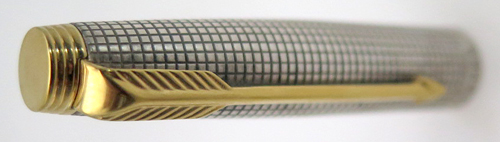 ITEM #6564: PARKER 75 FOUNAIN PEN STERLING SILVER CISLE PATTERN. GOLD PLATED TRIM AND FLUSH TASSIES. "0" ON FRONT GRADICULE BAND. NIB IS MED/FINE IN 14K.