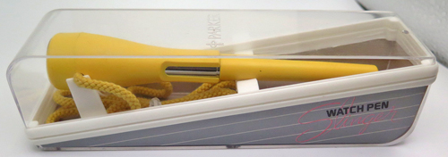 ITEM #6566: PAKER JOTTER SLINGER WATCH PEN IN YELLOW. BRANDED MORIOKA, TOKEI INC, JAPAN MODEL Y481C. In box. Uses battery type SR621SW.