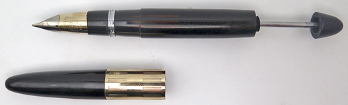 ITEM #6571: SHEAFER VAC FIL FOUNTIN PEN IN BLACK WITH INK VIEW PANEL. TRIUMPH 14 NIB IN BROAD. 