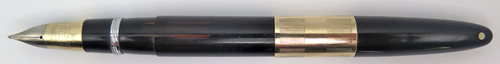 ITEM #6571: SHEAFER VAC FIL FOUNTIN PEN IN BLACK WITH INK VIEW PANEL. TRIUMPH 14 NIB IN BROAD. 