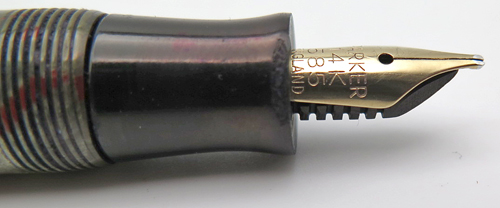 ITEM #6577: CANDADIAN PARKER FOUNTAIN PEN IN GREY MARBLE WITH RED VEINS. DEPRESSION-ERA TASSIE & JEWEL. ENGLISH-MADE 14K NIB IN BROAD.