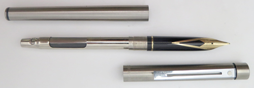 ITEM #6589: SHEAFFER SLIMLINE TARGA FOUNTAIN PEN IN BRUSHED STAINLESS STEEL. MODEL 1001xgs. GOLD ELECTROPLATED NIB IN MEDIUM. Gold electroplated band on section. Chrome Plated clip (possible mismatch clip).