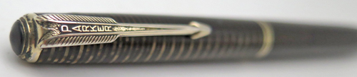 ITEM #6617: PARKER VACUMATIC PENCIL IN LAMINATED IN GOLD/BLACK. VACUMATIC TWIST PENCIL. TAKES .036" LEADS. GOLD FILLED TRIM. 