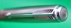 ITEM #6698: PARKER 51 PENCIL IN COCOA WITH LUSTRALOY CAP. This pencil is a cap actuated push type pencil that went with the Aerometric style fountain pen. No dents or dings in the metal. Demi size 51 Repeater pencil.