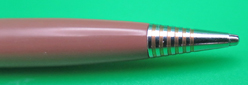 ITEM #6698: PARKER 51 PENCIL IN COCOA WITH LUSTRALOY CAP. This pencil is a cap actuated push type pencil that went with the Aerometric style fountain pen. No dents or dings in the metal. Demi size 51 Repeater pencil.