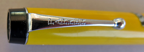 ITEM #6737: PARKER BIG RED IN MANDARIN YELLOW. HAS A BALL POINT BUT CAN BE EASILY CONVERTED TO A ROLLER BALL BY REMOVING THE EXTIONS ON THE FILLER.