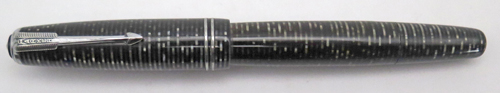 ITEM #6769: PARKER VACUMATIC STANDARD SIZE FOUNTAIN PEN IN BLACK/SILVER LAMINATED. NICKEL PLATED TRIM. DOUBLE BAND. PARKER ARROW NIB IN MEDIUM/FINE. 
