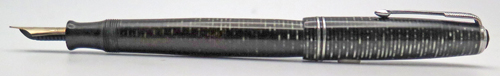 ITEM #6769: PARKER VACUMATIC STANDARD SIZE FOUNTAIN PEN IN BLACK/SILVER LAMINATED. NICKEL PLATED TRIM. DOUBLE BAND. PARKER ARROW NIB IN MEDIUM/FINE. 