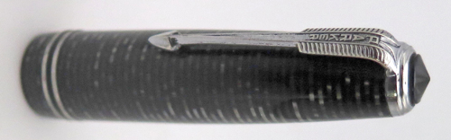 ITEM #6769: PARKER VACUMATIC STANDARD SIZE FOUNTAIN PEN IN BLACK/SILVER LAMINATED. NICKEL PLATED TRIM. DOUBLE BAND. PARKER ARROW NIB IN MEDIUM/FINE. 