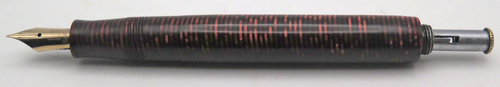 ITEM #6779: "George S. Parker VACUUM FILLER" (earlier than a vacumatic) IN LAMINATED BURGUNDY. LOCKDOWN FILLING SYSTEM WITH NO COROSION ON THE PLUNGER TUBE. STANDARD SIZE PEN WITH DOUBLE JEWEL. GOLD FILL TRIM. PARKER ARROW VAC NIB IN GOLD COLOR. NIB GRADE IS FINE. Made in USA.