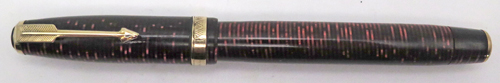 ITEM #6779: "George S. Parker VACUUM FILLER" (earlier than a vacumatic) IN LAMINATED BURGUNDY. LOCKDOWN FILLING SYSTEM WITH NO COROSION ON THE PLUNGER TUBE. STANDARD SIZE PEN WITH DOUBLE JEWEL. GOLD FILL TRIM. PARKER ARROW VAC NIB IN GOLD COLOR. NIB GRADE IS FINE. Made in USA.