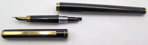 ITEM #6834: SAILOR ULTRA SLIM CHALANA FOUNTAIN PEN IN BLACK LACQUER. FINE SAILOR NIB "TIGP MADE IN JAPAN". BLACK DOUBLE JEWEL. GOLD PLATED TRIM. NEW OLD STOCK IN BOX. COMES WITH SLIM CARTRIGE PACK OF 4 IN BLACK.