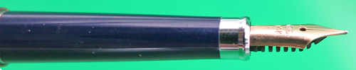 ITEM #6836: SAILOR ULTRA SLIM CHALANA FOUNTAIN PEN IN BROWN LACQUER STRIPE WITH NAVY SECTION. BLACK DOUBLE JEWEL. CAP JEWEL READS "JAPAN". 14K "SAILOR" NIB IN FINE. GOLD PLATED TRIM. NEW OLD STOCK IN BOX. Part #11-0520