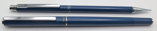 ITEM #6837: SAILOR SLIM CHALANA FOUNTAIN PEN + PENCIL IN BLUE. CHROME TRIM. STEEL "SAILOR MADE IN JAPAN" NIB IN FINE. DOUBLE JEWELS IN BLUE. IMPACT PENCIL WITH CLEAN ERASER
