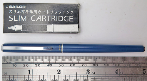 ITEM #6837: SAILOR SLIM CHALANA FOUNTAIN PEN + PENCIL IN BLUE. CHROME TRIM. STEEL "SAILOR MADE IN JAPAN" NIB IN FINE. DOUBLE JEWELS IN BLUE. IMPACT PENCIL WITH CLEAN ERASER