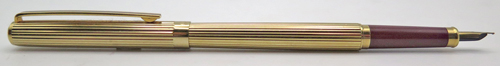 ITEM #6839: SAILOR CHALANA FOUNTAIN PEN + BALLPOINT SET IN GOLD STRIPE. BURGUNDY SECTION, JEWELS + CLIP STRIPE. FINE GOLD NIB WITH IMPRINT "SAILOR TIGP MADE IN JAPAN". 