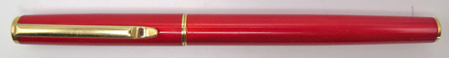 ITEM #6858: PILOT MINUET FOUNTAIN PEN IN RED. GOLD PLATED TRIM. GOLD COLORED "SUPERLOY" NIB IN FINE. SQUEEZE FILLER. NEW OLD STOCK.