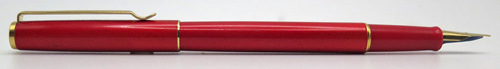 ITEM #6858: PILOT MINUET FOUNTAIN PEN IN RED. GOLD PLATED TRIM. GOLD COLORED "SUPERLOY" NIB IN FINE. SQUEEZE FILLER. NEW OLD STOCK.
