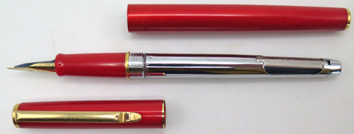 ITEM #6858: PILOT MINUET FOUNTAIN PEN IN RED. GOLD PLATED TRIM. GOLD COLORED "SUPERLOY" NIB IN FINE. SQUEEZE FILLER. NEW OLD STOCK.