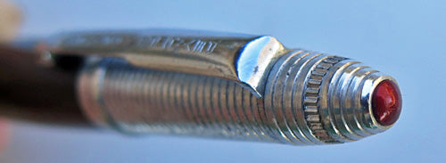 REYNOLDS INTERNATIONAL BALLPOINT IN ANODIZED BLACK WITH RED JEWEL