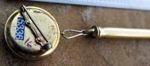 Cross Pencil on Retracting Cable Brooch in Gold